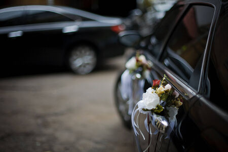 Luxury wedding car decorated with flowersの写真素材