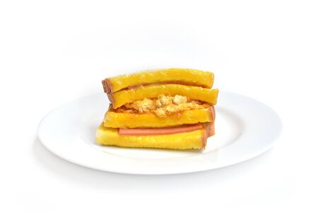 Sandwiches with Bologna and dried shredded pork on white plate.