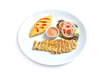 Breakfast on white plate on white backgroundの写真素材
