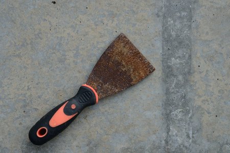 Rust Construction equipment on Concrete