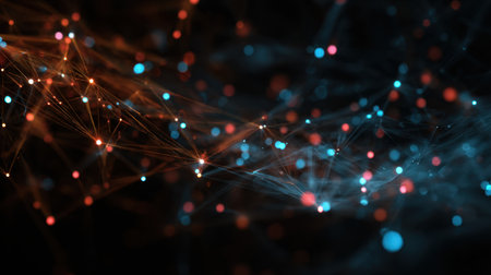 This captivating image features an abstract network connection, showcasing vibrant light points in orange and blue, set against a dark background.の素材