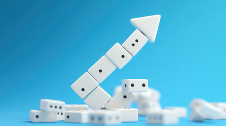 Dominoes toppling toward upward arrow icon, business strategy and impact chain visualの素材