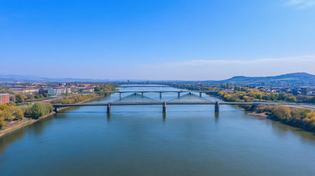 Bridges connecting islands over a wide river, part of a modern transportation networkの素材