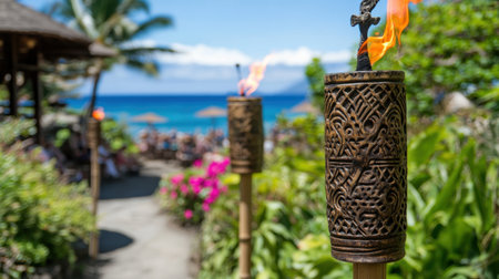 Tiki torches and rustic signage pointing toward beachside summer festival eventsの素材