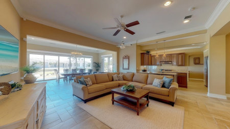Spacious living room with corner sectional, statement art, and harmonious design elementsの素材