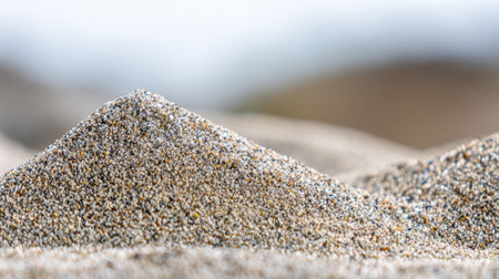A stunning close-up view of soft sand dunes highlights intricate textures and subtle gradients, embodying tranquility and natural beauty, ideal for nature lovers.の素材