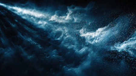 This captivating image features ethereal blue and white smoke clouds illuminated by subtle light rays, creating an abstract and mystical atmosphere perfect for artistic projects.の素材