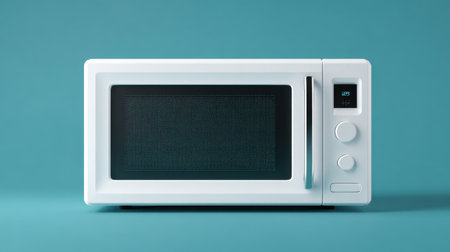A stylish modern microwave oven in white color on a turquoise background, perfect for enhancing culinary spaces with its sleek design and digital interface.の素材