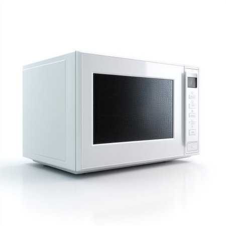 A modern white microwave appliance placed on a white background, ideal for kitchen, cooking tasks, and food preparation, emphasizing utility and sleek design.の素材