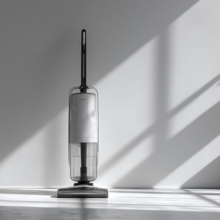 A stylish and modern upright vacuum cleaner elegantly positioned in a bright indoor space, showcasing a blend of functionality and aesthetic appeal.の素材