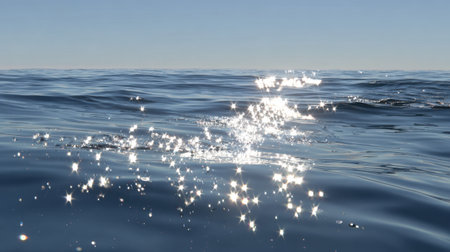 A stunning view of sunlight reflecting on calm ocean waters creates a serene and picturesque setting, perfect for evoking tranquility and natural beauty in photography.の素材