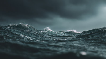 A breathtaking scene capturing dark ocean waves beneath a dramatic sky, evoking feelings of awe and admiration for nature's raw and untamed beauty.の素材