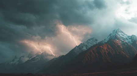 Capture the raw beauty of nature with this stunning image featuring lightning striking a majestic mountain range under dark, swirling clouds during a stormy twilight.の素材