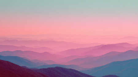 A breathtaking view of rolling mountains bathed in soft pink and blue hues at dusk, creating a tranquil and serene atmosphere perfect for nature lovers.の素材
