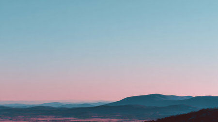 This stunning landscape captures a serene dusk scene with gentle mountains painted in soft pastel hues under a clear sky, evoking tranquility and peace.の素材