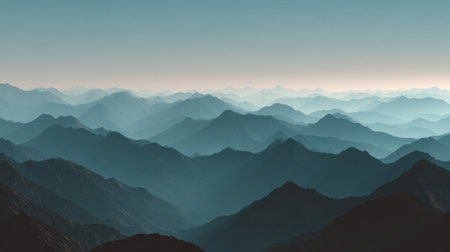 Experience a breathtaking view of layered mountains bathed in soft blue hues, creating a serene atmosphere. This tranquil landscape captures the essence of natural beauty.の素材