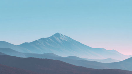 A breathtaking mountain landscape showcasing soft blue hues and gentle hills at sunrise, creating a peaceful and tranquil atmosphere perfect for nature lovers.の素材