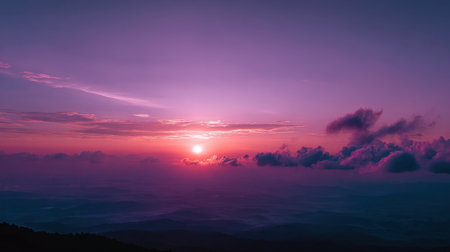 A stunning sunset casts vibrant colors across the sky, illuminating the mountains and creating a serene atmosphere ideal for relaxation and inspiration.の素材
