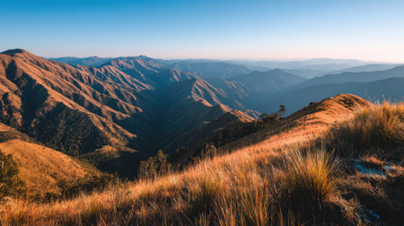 A stunning mountain landscape features rolling hills and a colorful sky at dusk, evoking a sense of tranquility and connection with nature's beauty.の素材