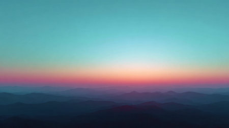 A peaceful mountain landscape captures the essence of early morning light. The sky transitions from soft pink to deep blue, creating a serene atmosphere ideal for reflection.の素材