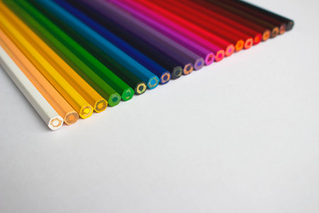 Colored pencils arranged chromatically.の写真素材