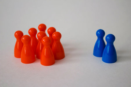 Board game pieces arranged in groups.