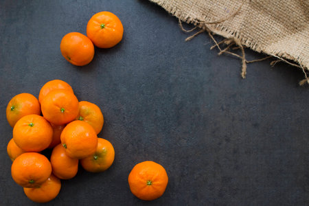 Overhead view of some mandarin oranges.の写真素材