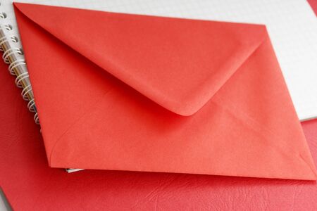 red envelope on white-red background, close upの写真素材