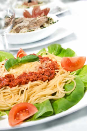 Spaghetti Bolognese with Basil Leafの写真素材