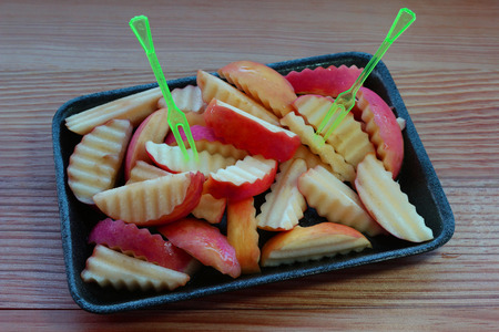 Apple chops on wood pattern.