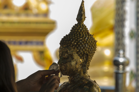 Picture of gilded Buddha statue in Thailandの写真素材