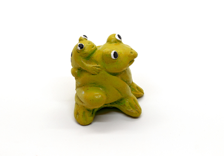 Statue of frog on a white backgroundの写真素材