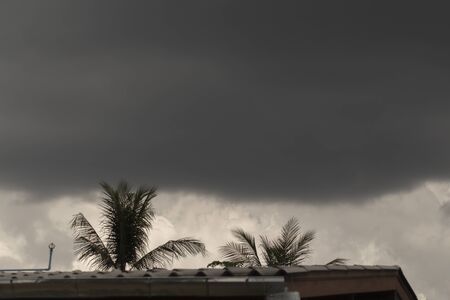 Rain clouds on the roof, dark cloudsの写真素材