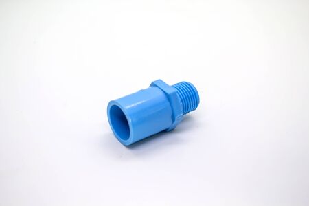 Plastic joints for water pipes on a white background, spare equipmentの写真素材