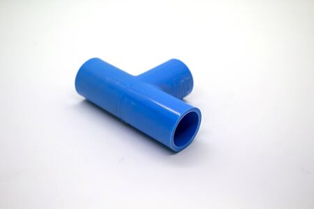 Plastic joints for water pipes on a white background, spare equipmentの写真素材