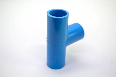 Plastic joints for water pipes on a white background, spare equipmentの写真素材