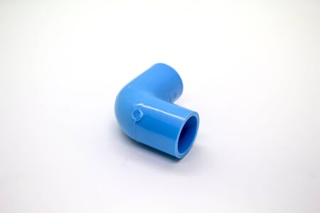 Plastic joints for water pipes on a white background, spare equipment