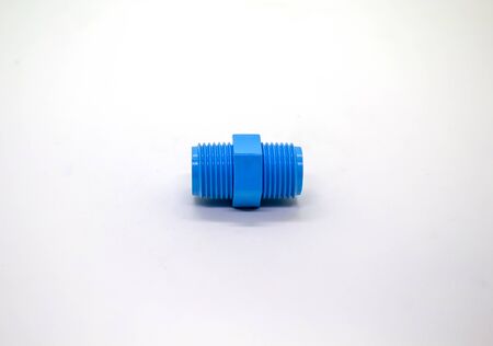 Plastic joints for water pipes on a white background, spare equipmentの写真素材