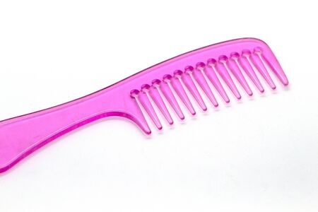 Pink comb isolated white backgroundの写真素材