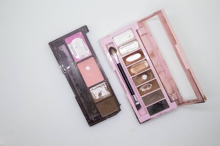 Old eye shadow on a white backgroundの写真素材