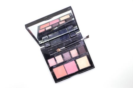 Old eye shadow on a white backgroundの写真素材