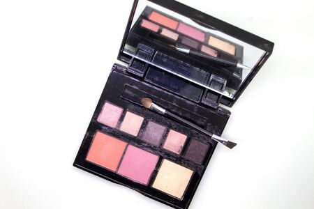 Old eye shadow on a white backgroundの写真素材