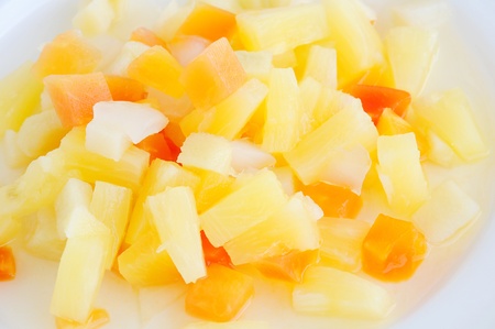 Fruits salad on white dish. の写真素材