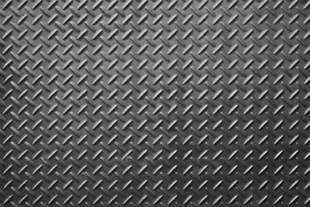 Metal diamond plate or old checkered steel plate with rustproof coating well. background. texture.
