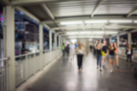 Abstract background. Blurred image of people walking on the overpass.の写真素材
