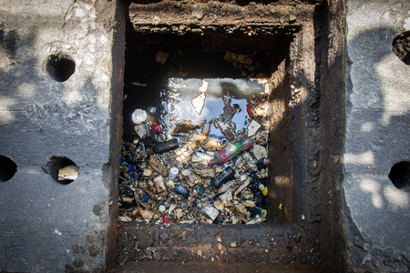 Waste garbage and grease in the drain. That is why the drain pipe is clog up. Part of the flood...