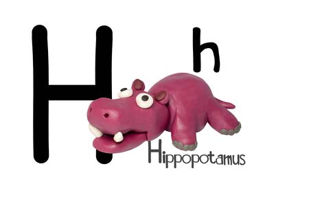 Statues like cute animals for children. Molding from plasticine for learning alphabet-H. Cartoon characters, Hippopotamus isolated on white background.の写真素材