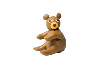 Statues like cute animals for children. Molding from plasticine. Cartoon characters, Bear isolated on white background with clipping path.の写真素材
