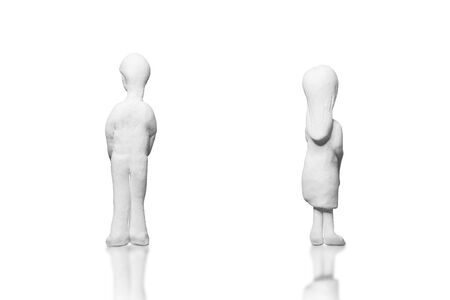 The statues from the white clay is a man and woman who is a lover or couple on a white background  . Ideas about the day of love or valentine's day.の写真素材