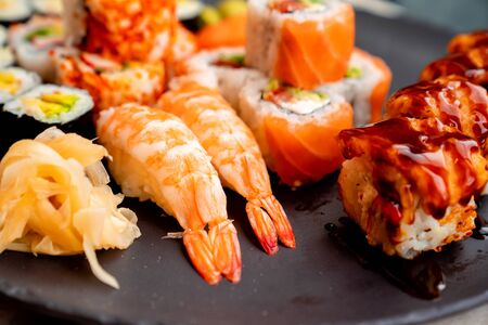 Rolls with salmon, caviar, shrimp, avocado, cucumber, wasabiの写真素材
